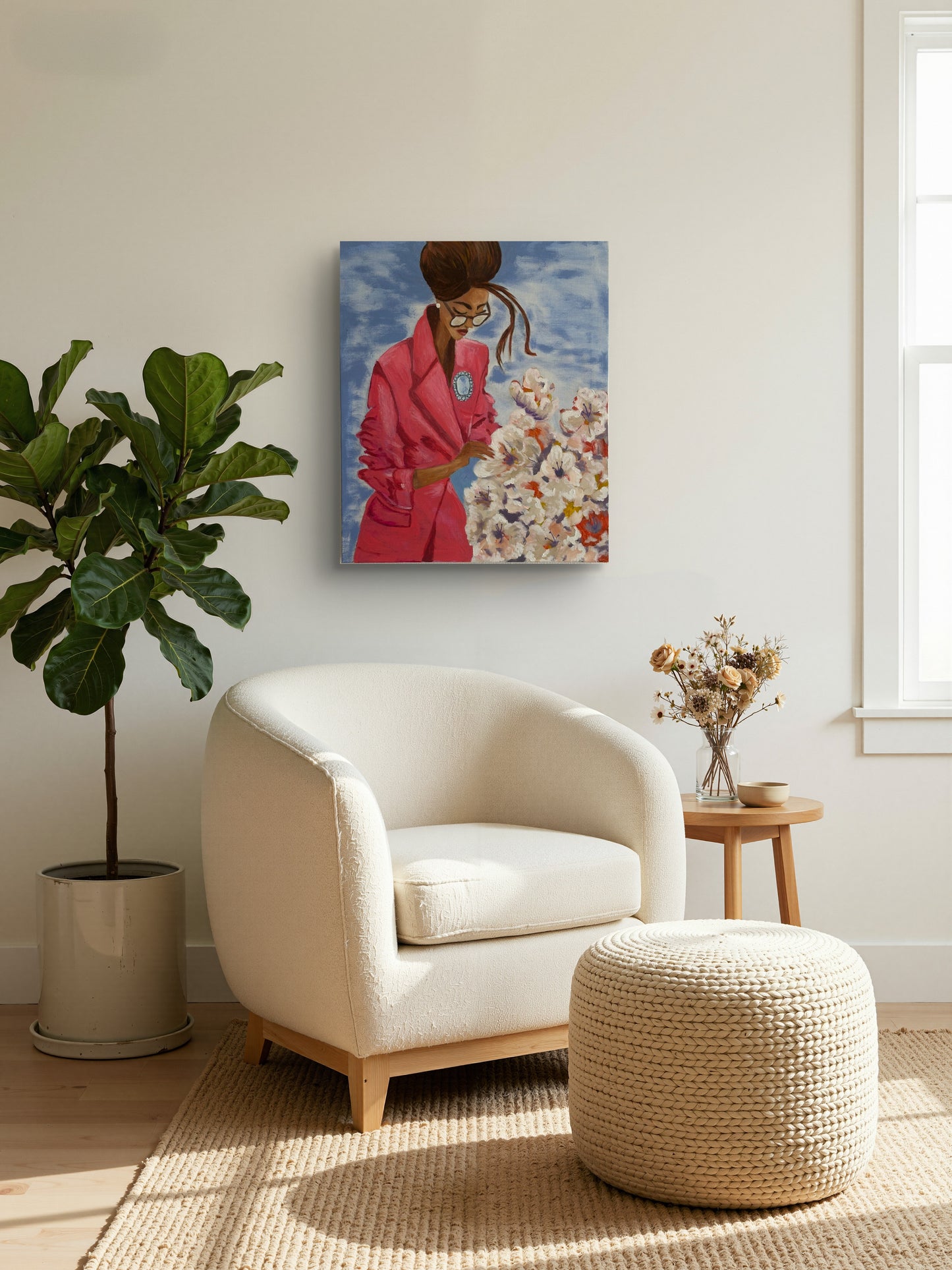 Original Painting in Living room with a white armchair, ottoman, potted plant, and wall art.
